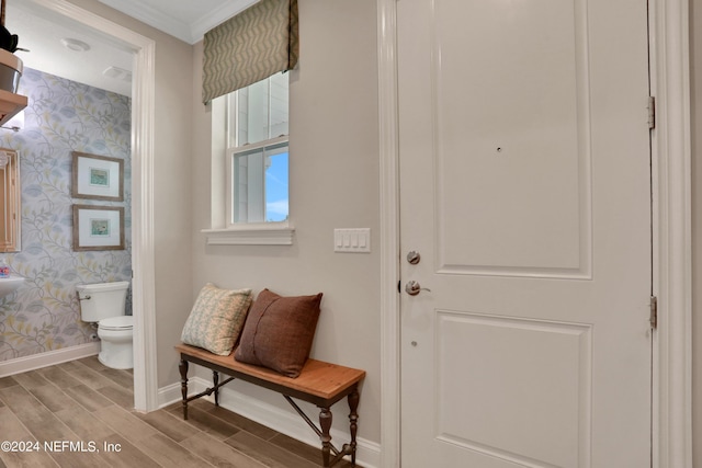 75 Mallow Ct, Saint Johns, FL 32259 - entryway with crown molding, baseboards, wallpapered walls, and wood finished floors