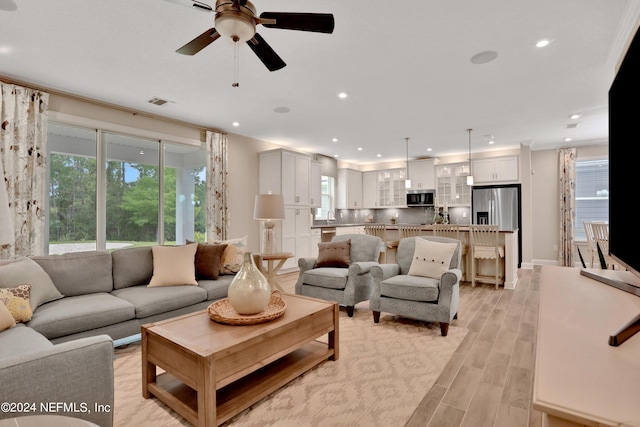 75 Mallow Ct, Saint Johns, FL 32259 - living room featuring light wood finished floors, a ceiling fan, recessed lighting, and a wealth of natural light