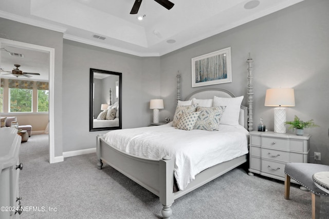 75 Mallow Ct, Saint Johns, FL 32259 - carpeted bedroom with visible vents, a ceiling fan, baseboards, and a tray ceiling