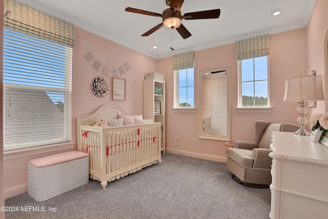 75 Mallow Ct, Saint Johns, FL 32259 - carpeted bedroom with crown molding, a nursery area, baseboards, and ceiling fan