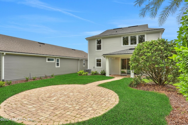 75 Mallow Ct, Saint Johns, FL 32259 - back of property with a patio area, central air condition unit, and a yard