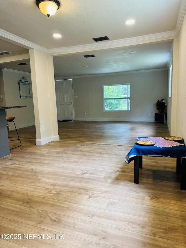 2443 Pine Estates Rd E, Jacksonville, FL 32218 - rec room featuring crown molding, visible vents, baseboards, and wood finished floors
