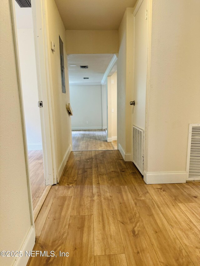 2443 Pine Estates Rd E, Jacksonville, FL 32218 - hallway featuring visible vents, light wood-type flooring, and baseboards