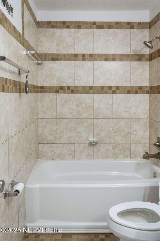 601 Robert Livingston St, Orange Park, FL 32073 - bathroom featuring toilet and shower / tub combination