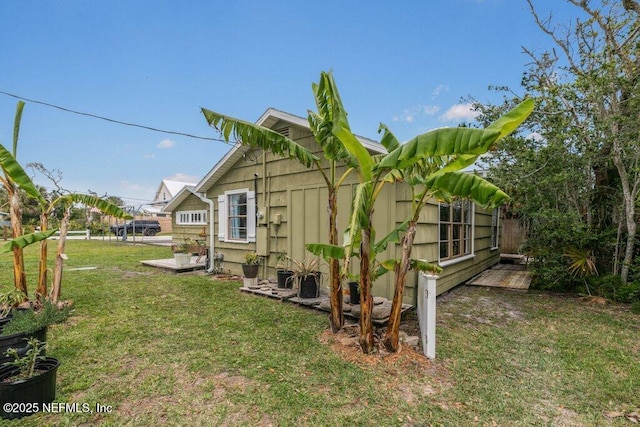 6960 Charles St, Saint Augustine, FL 32080 - view of home's exterior with a yard