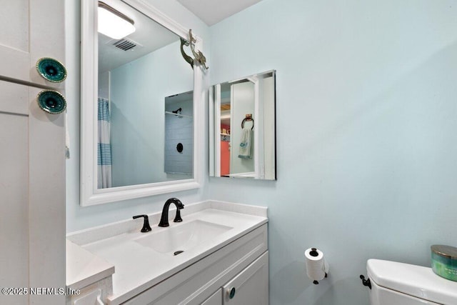 6960 Charles St, Saint Augustine, FL 32080 - full bath featuring visible vents, toilet, a shower with shower curtain, and vanity