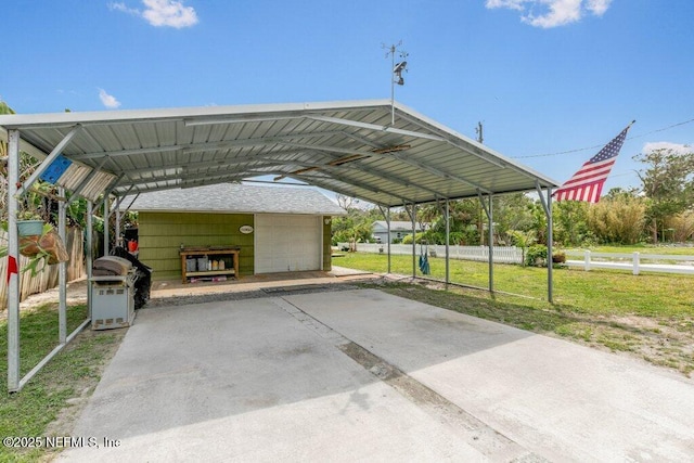 6960 Charles St, Saint Augustine, FL 32080 - view of vehicle parking featuring a detached garage and fence