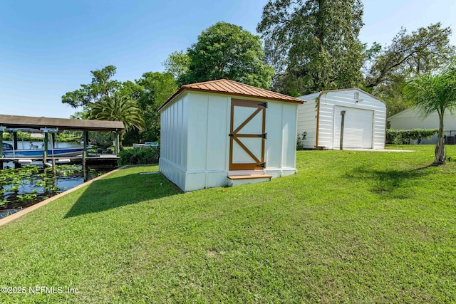 view of shed with a water view