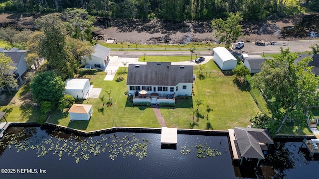 drone / aerial view with a water view