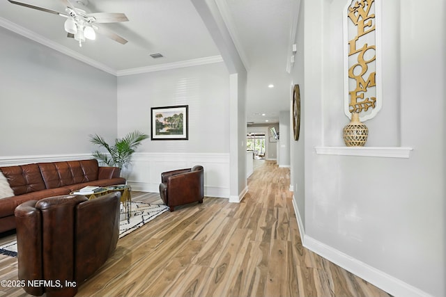 105 Weathered Oak Ct, Saint Johns, FL 32259 - hall featuring light wood-style flooring, ornamental molding, arched walkways, and recessed lighting