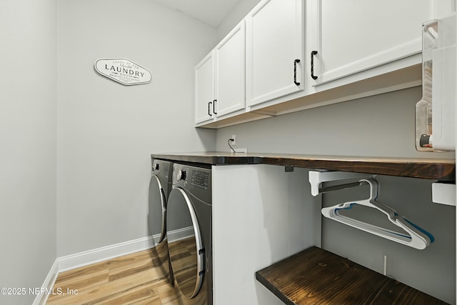 105 Weathered Oak Ct, Saint Johns, FL 32259 - laundry area with cabinet space, independent washer and dryer, and light wood-type flooring