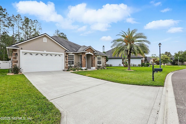 105 Weathered Oak Ct, Saint Johns, FL 32259 - ranch-style house featuring a garage, a front lawn, concrete driveway, stucco siding, and stone siding