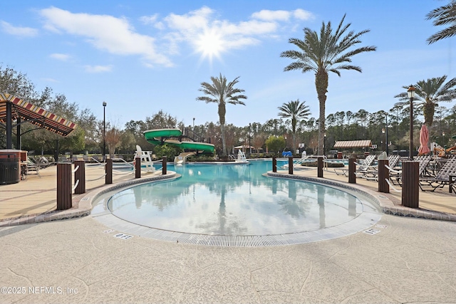 105 Weathered Oak Ct, Saint Johns, FL 32259 - community pool with a water slide and a patio