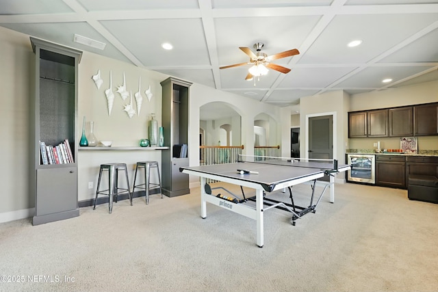 playroom with wet bar, light carpet, visible vents, coffered ceiling, and beverage cooler