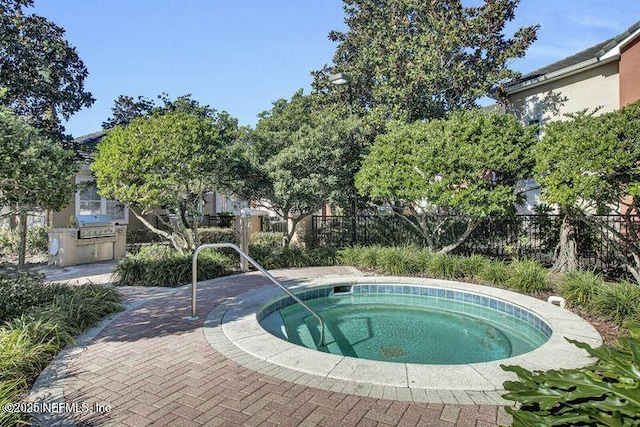 10075 N Gate Pkwy Unit 614, Jacksonville, FL 32246 - view of swimming pool featuring a patio area, a hot tub, fence, and area for grilling