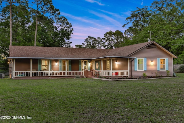 4864 County Road 218, Middleburg, FL 32068 - ranch-style house with a yard, central AC, a shingled roof, and covered porch