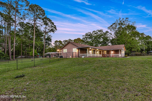 4864 County Road 218, Middleburg, FL 32068 - view of front of property with fence and a lawn