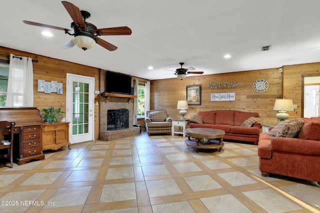 4864 County Road 218, Middleburg, FL 32068 - living room featuring visible vents, a brick fireplace, a ceiling fan, and recessed lighting