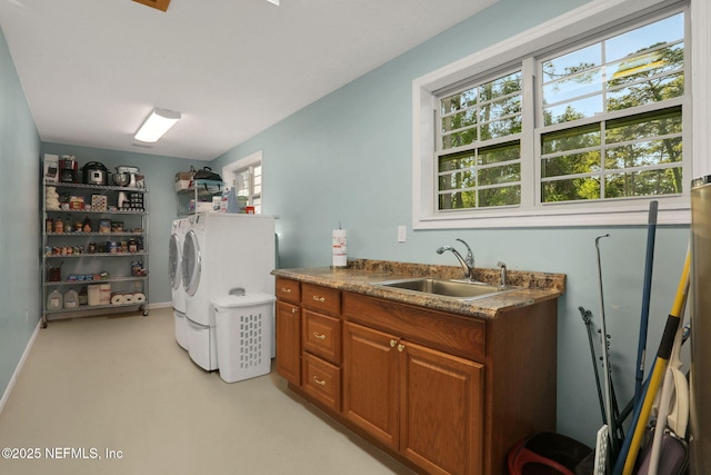 4864 County Road 218, Middleburg, FL 32068 - clothes washing area with a sink, independent washer and dryer, cabinet space, and baseboards