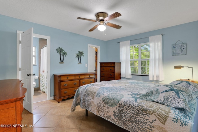 4864 County Road 218, Middleburg, FL 32068 - bedroom featuring light tile patterned floors, ceiling fan, and a textured ceiling