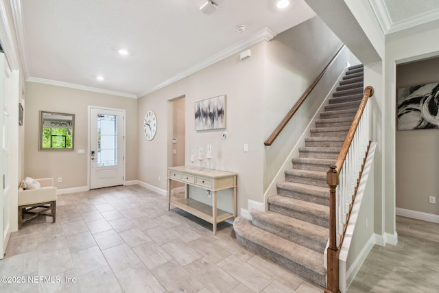 entrance foyer featuring recessed lighting, stairway, baseboards, and crown molding
