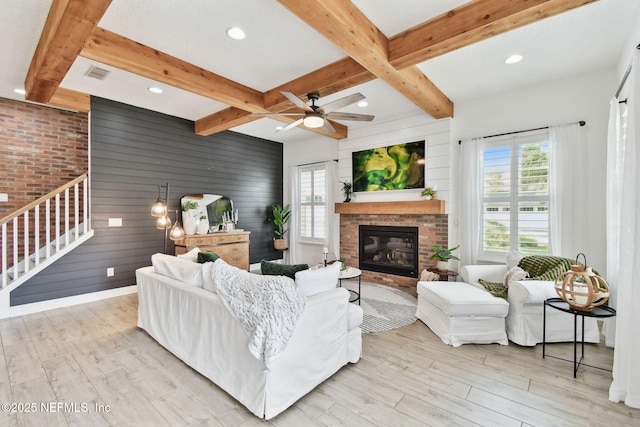 258 Haas Ave, Saint Augustine, FL 32095 - living area featuring wood finished floors, recessed lighting, a brick fireplace, beam ceiling, and a ceiling fan