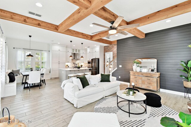 258 Haas Ave, Saint Augustine, FL 32095 - living area featuring a ceiling fan, beamed ceiling, light wood finished floors, recessed lighting, and baseboards