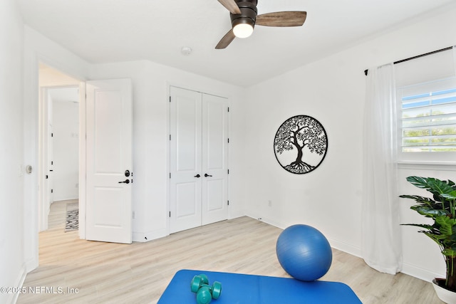 258 Haas Ave, Saint Augustine, FL 32095 - exercise room with light wood finished floors, a ceiling fan, and baseboards