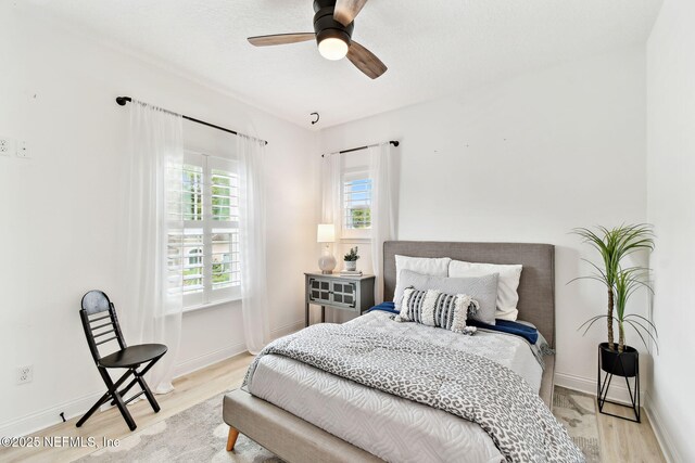 258 Haas Ave, Saint Augustine, FL 32095 - bedroom with wood finished floors, baseboards, and ceiling fan