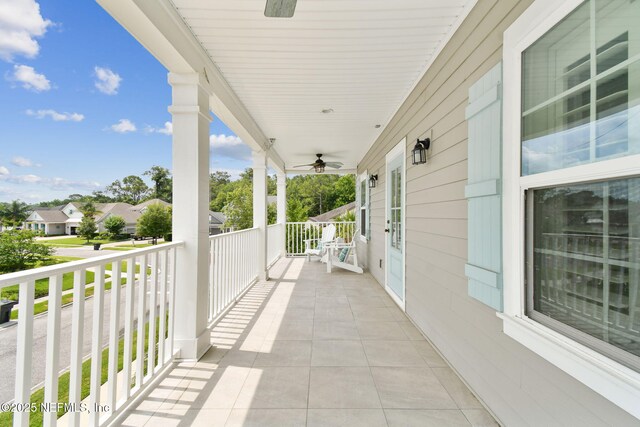 258 Haas Ave, Saint Augustine, FL 32095 - covered porch with a ceiling fan and a residential view