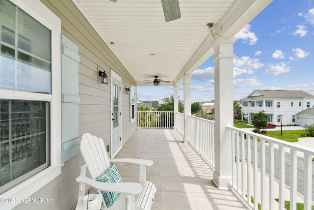258 Haas Ave, Saint Augustine, FL 32095 - covered porch featuring a ceiling fan and a residential view