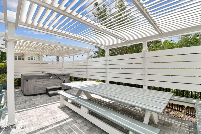 258 Haas Ave, Saint Augustine, FL 32095 - view of patio with a hot tub, a pergola, and outdoor dining area