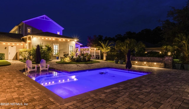 258 Haas Ave, Saint Augustine, FL 32095 - pool at twilight with a patio area and an outdoor pool