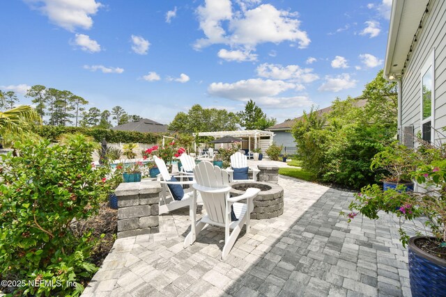 258 Haas Ave, Saint Augustine, FL 32095 - view of patio featuring an outdoor fire pit