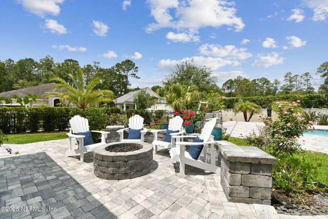 258 Haas Ave, Saint Augustine, FL 32095 - view of patio / terrace featuring a fire pit