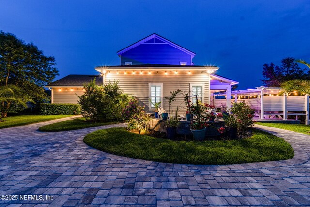 258 Haas Ave, Saint Augustine, FL 32095 - view of front of property featuring curved driveway and a pergola