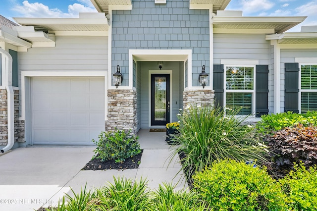 3313 Loofah Pl, Green Cove Springs, FL 32043 - property entrance featuring driveway, stone siding, and a garage