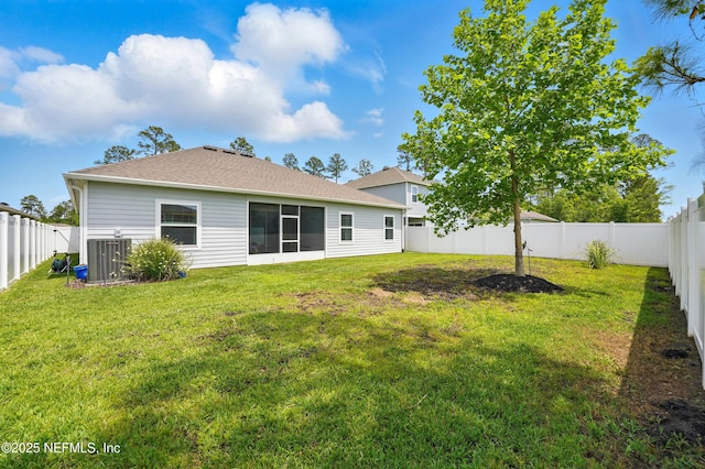 3313 Loofah Pl, Green Cove Springs, FL 32043 - back of property featuring a fenced backyard, a shingled roof, a yard, and central air condition unit