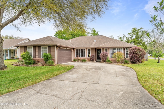 9083 Sable Ridge Ct, Jacksonville, FL 32244 - single story home with roof with shingles, a front yard, brick siding, a garage, and driveway