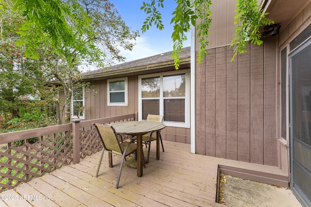 9083 Sable Ridge Ct, Jacksonville, FL 32244 - wooden deck with outdoor dining area