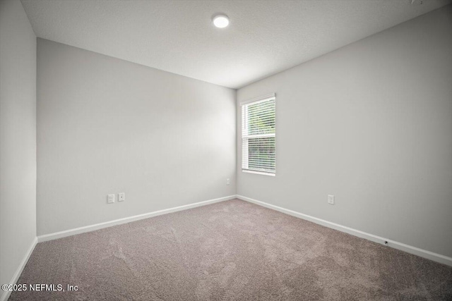 8922 Free Ave, Jacksonville, FL 32211 - spare room with carpet flooring and baseboards