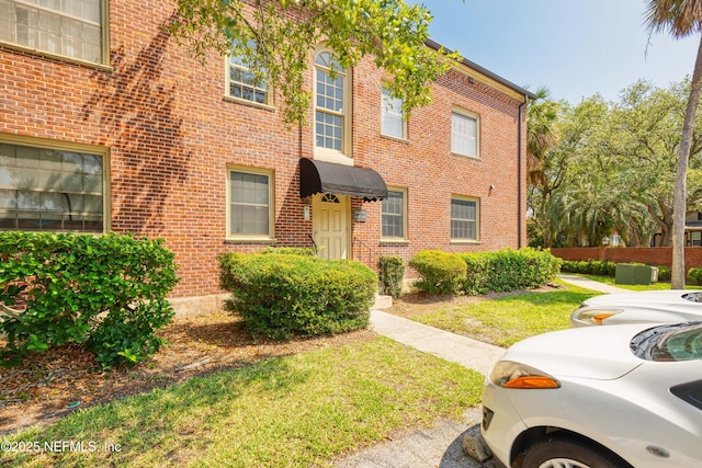 multi unit property featuring brick siding