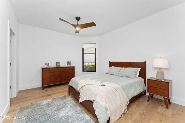 1592 Harbour Club Dr, Ponte Vedra Beach, FL 32082 - bedroom featuring wood finished floors, baseboards, and a ceiling fan
