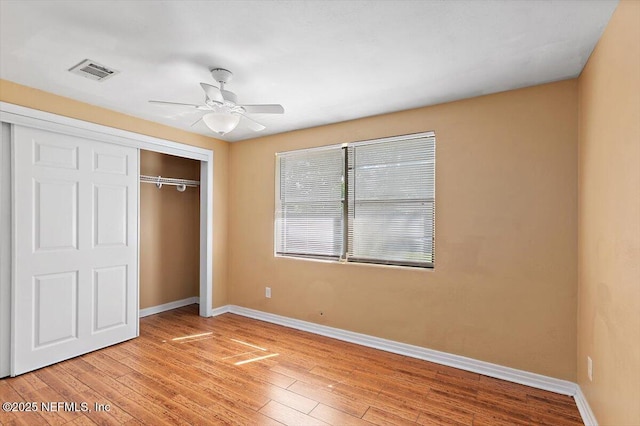4263 Springwood Rd, Jacksonville, FL 32207 - unfurnished bedroom featuring light wood-style floors, visible vents, baseboards, and a closet