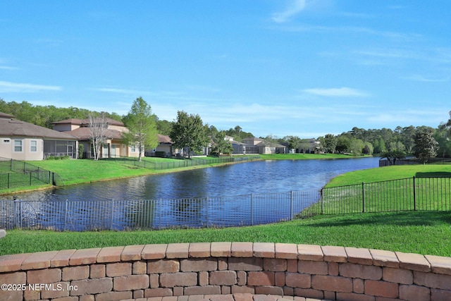 property view of water with fence