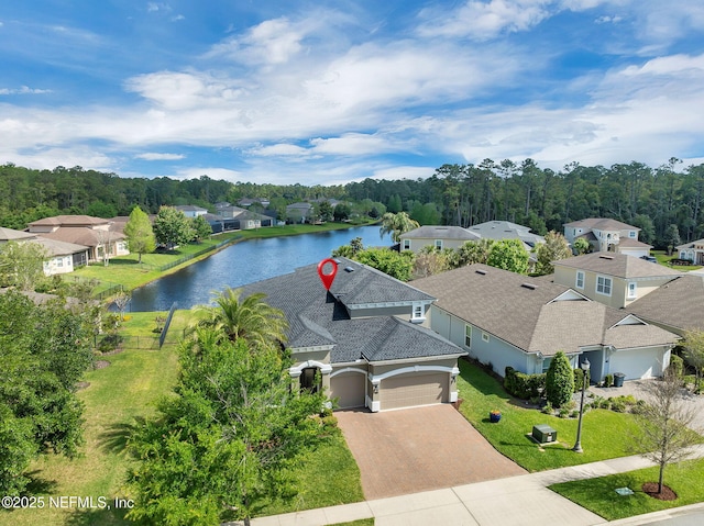 aerial view with a water view and a residential view