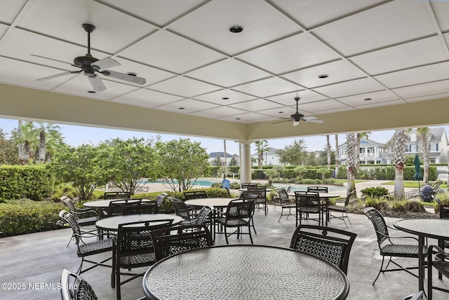 view of patio / terrace featuring outdoor dining space and a ceiling fan