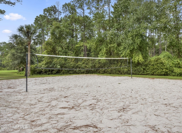 view of property's community featuring volleyball court
