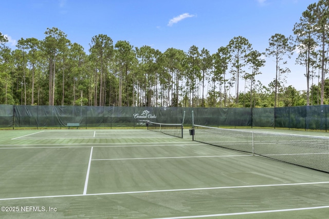 view of sport court featuring community basketball court and fence