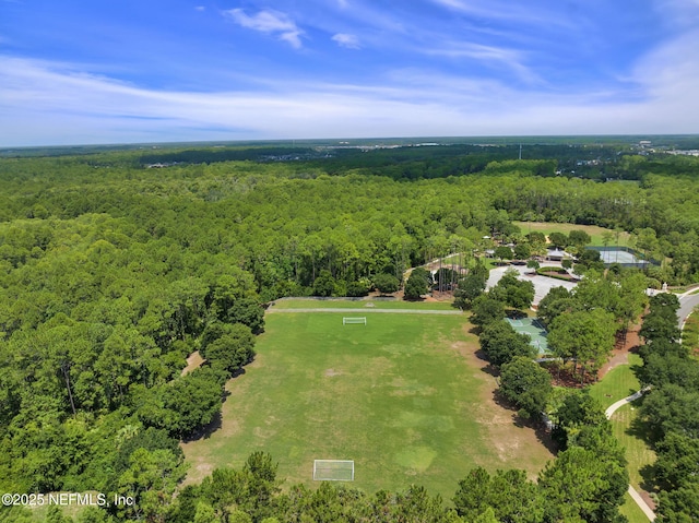 bird's eye view featuring a forest view